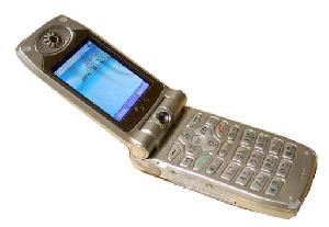 Mobilais telefons LG K8000 foto